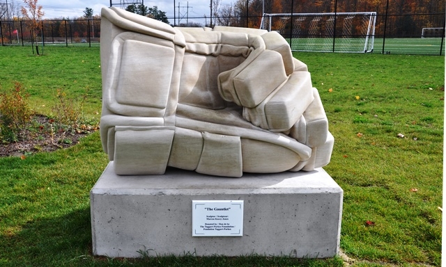 A limestone statue of a hockey glove.